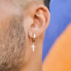 Polished Cross Round Huggie Earrings In Yellow Gold