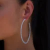 Large Eternity Hoop Earrings In White Gold