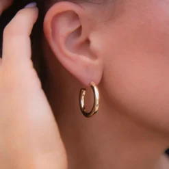 Small Tube Hoop Earrings In Yellow Gold